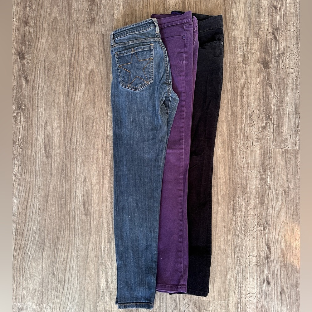 Three pairs of skinny pants and jeans, Miley Cyrus & Abbey Dawn